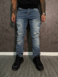 Jeans Slim Fit Destroyed Azul Claro